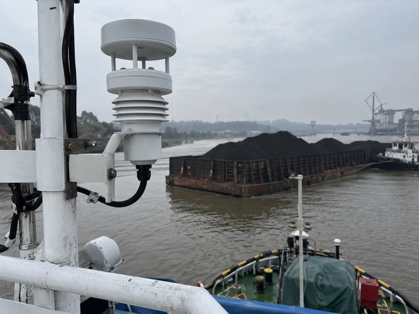 Marine weather sensor mounted on a vessel mast